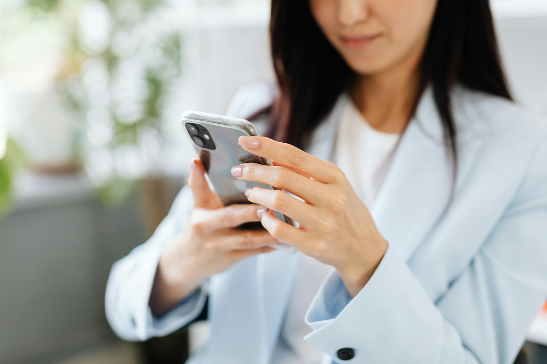 woman browsing her smartphone